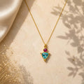 Pink chalcedony και sky blue topaz pendant κολιέ, χρυσό 925 ασήμι χειροποίητο, flat lay σε μάρμαρο — Celestial Steel
