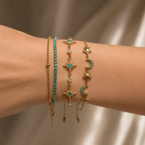 Βραχιόλι με star και moon charms τιρκουάζ ζιργκόν φορεμένο stacked, χρυσό ανοξείδωτο ατσάλι — Celestial Steel